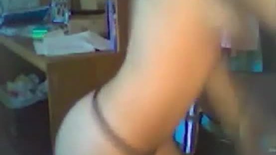 Cute brunette girl dances on webcam