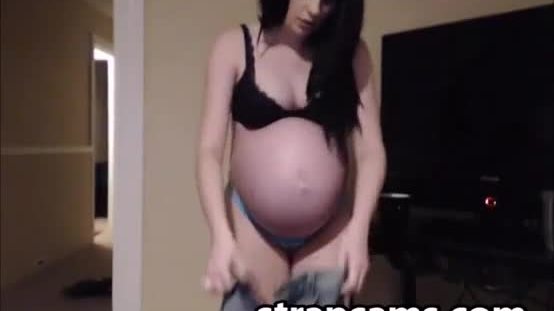 Pregnant brunette teen shows off