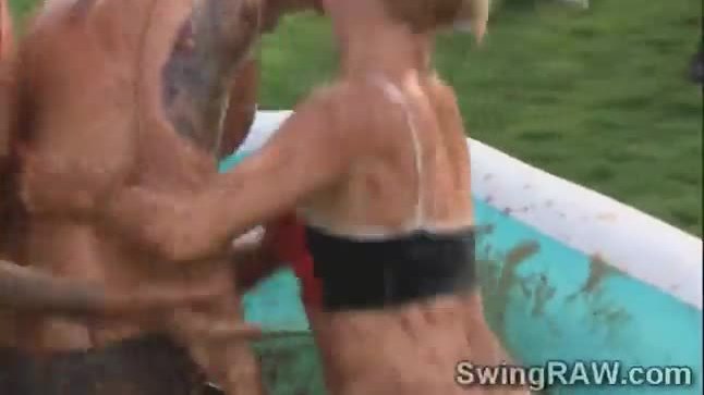 Gorgeous blonde and brunettes get filthy fighting in the mud